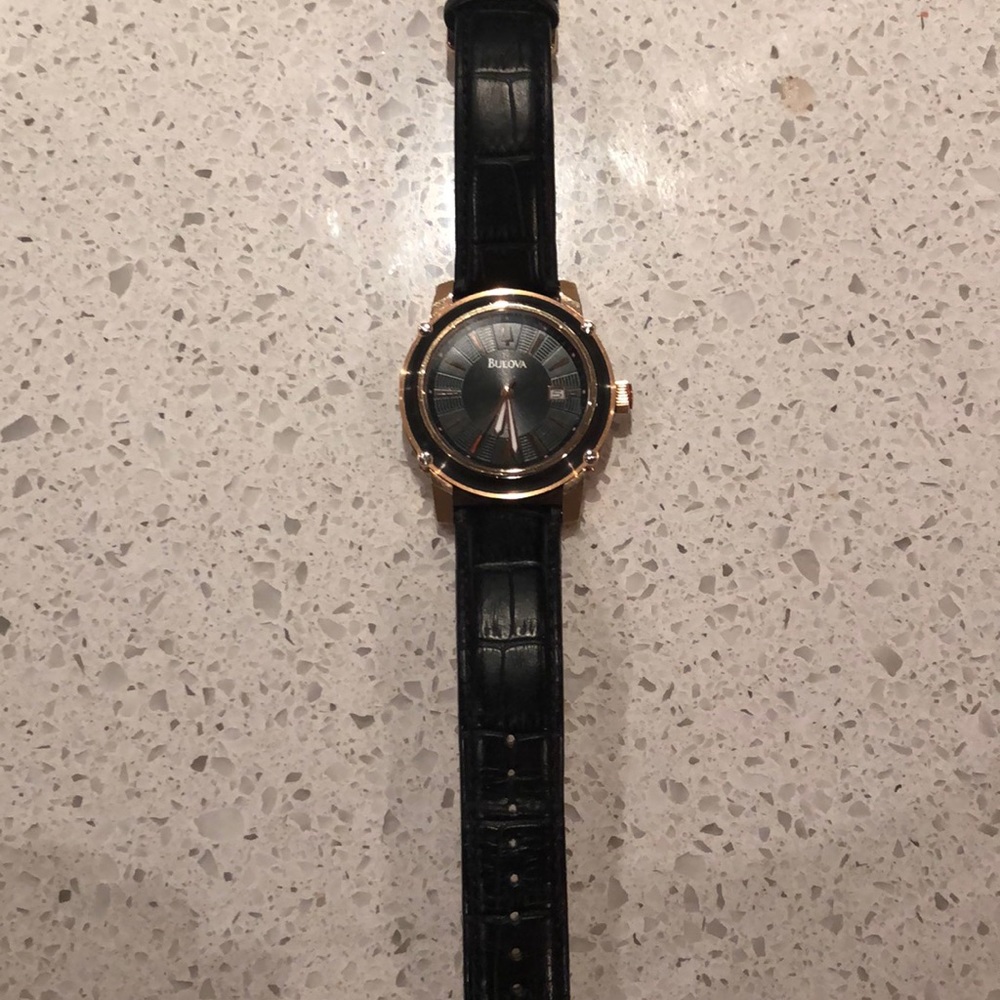 Men’s Bulova watch.